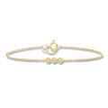 10kt yellow gold diamond bracelet with bezel-set round stones and lobster clasp