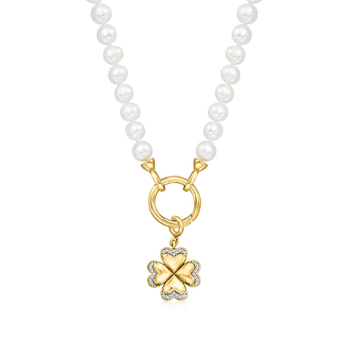 Gold four-leaf clover charm pendant on white pearl strand with clasp loop