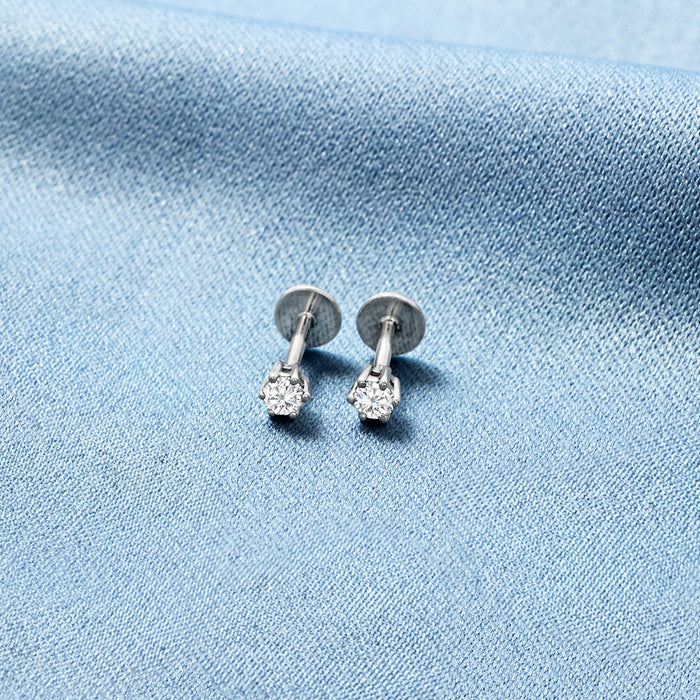 Sterling silver round diamond stud earrings with flat backs.