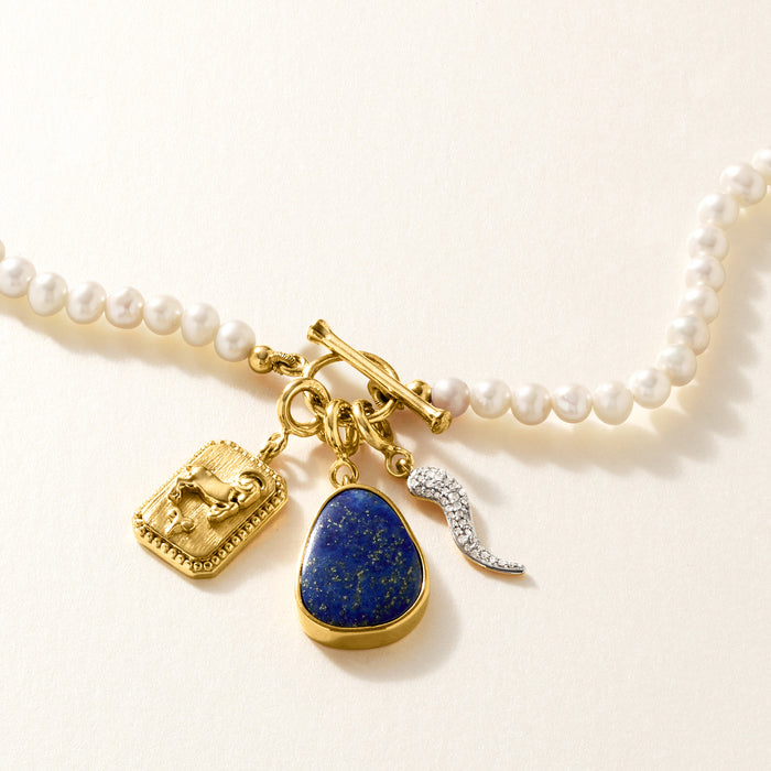 Diamond Italian horn charm with bail on pearl necklace with small gold accents