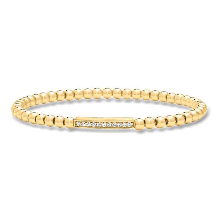 Gold bead stretch bracelet with diamond bar and small clear stones