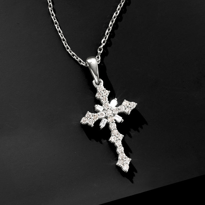 Sterling silver diamond cross pendant necklace, close-up of gemstone cross on chain