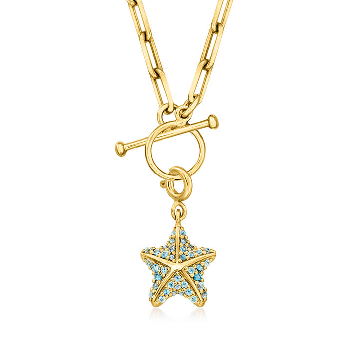 Gold over sterling starfish charm with blue topaz stones on a toggle chain