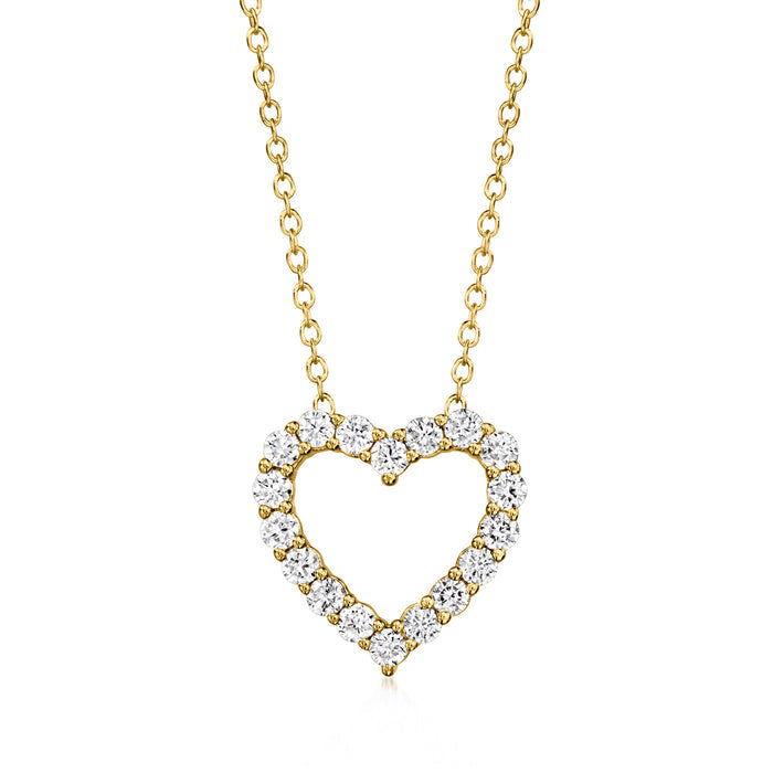Gold heart pendant necklace with pave-style clear stones on a fine chain