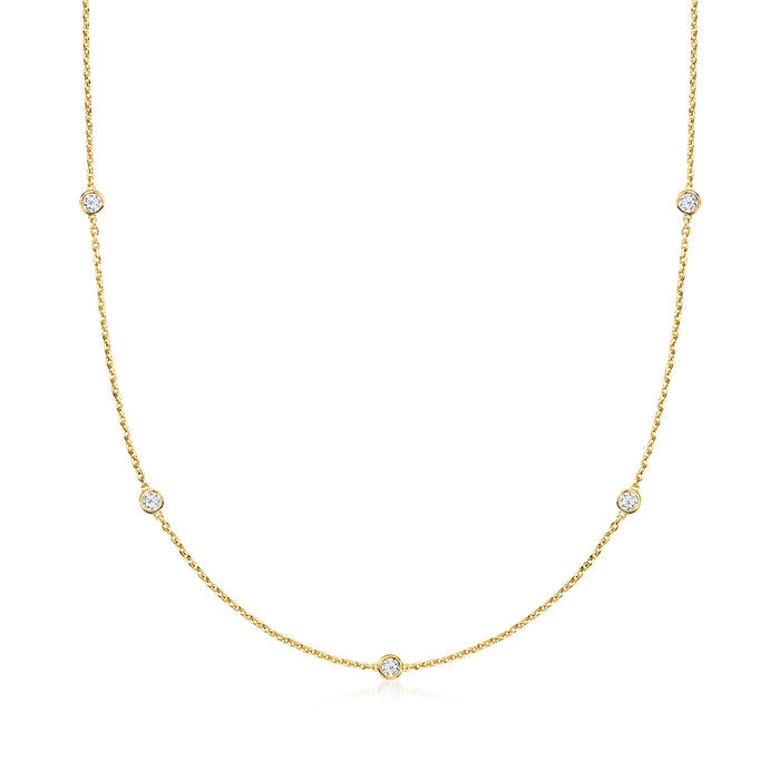 Gold station necklace with round clear diamond accents in a line