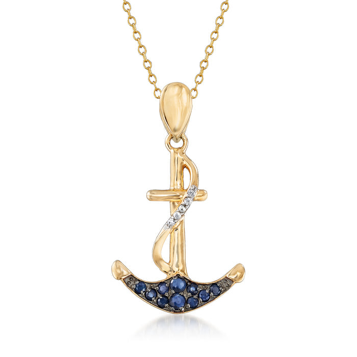 Gold-tone anchor pendant necklace with blue sapphire bezel stones and clear accents