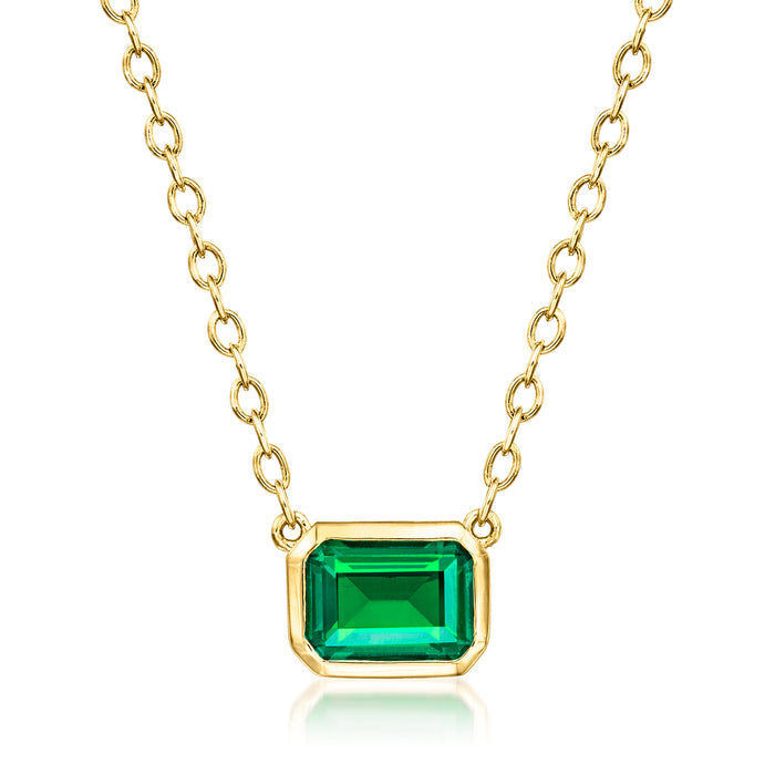 Gold link necklace with rectangular emerald-cut green gemstone pendant