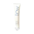 Tube of 'flow' hair product on a gray background