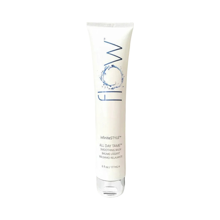 Tube of 'flow' hair product on a gray background